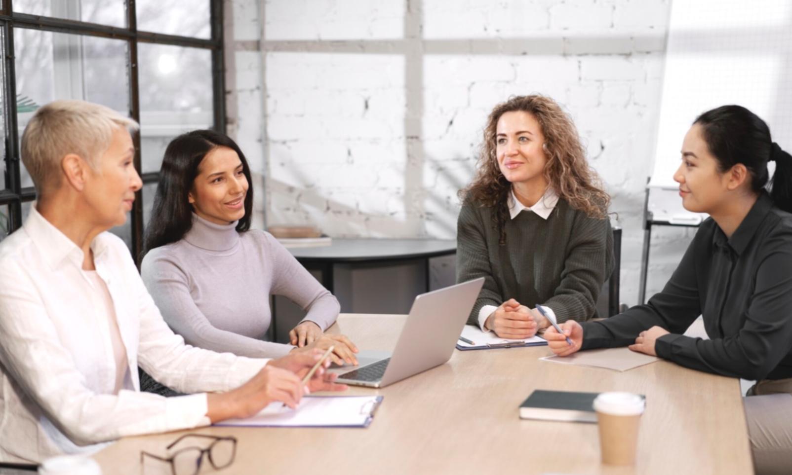 Business owner reviewing financial reports with confidence and clarity
